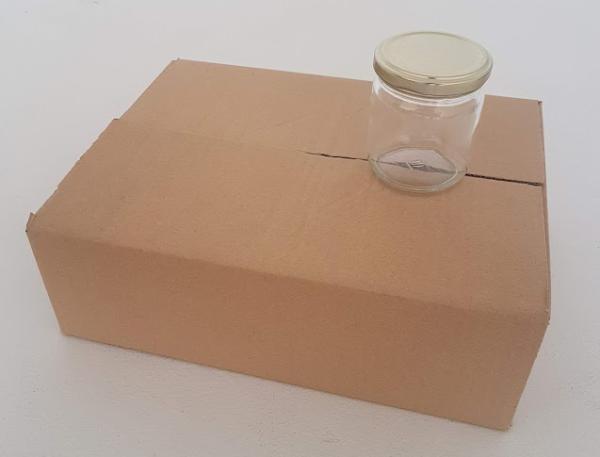 Karton Honiggläser mit Metalldeckel, 12 Gläser à 250 g.